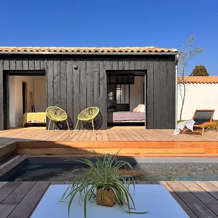 With Pool Between Village, Beach, And Forest