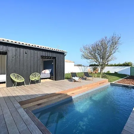 With Pool Between Village, Beach, And Forest