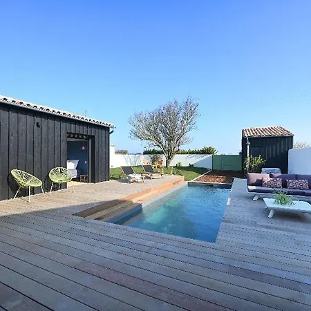 With Pool Between Village, Beach, And Forest